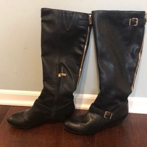 Tall black knee height boot